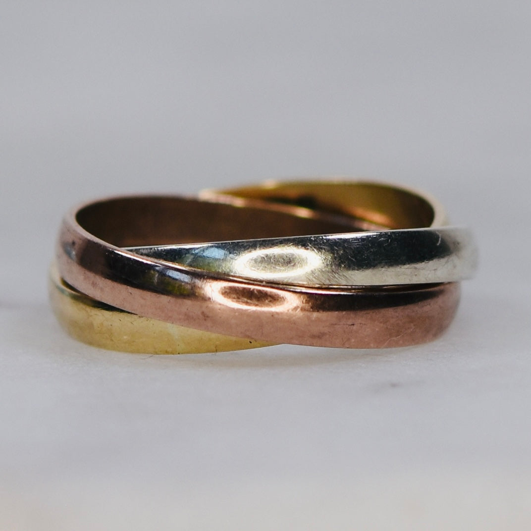 Vintage rolling ring in tri color gold from Manor Jewels