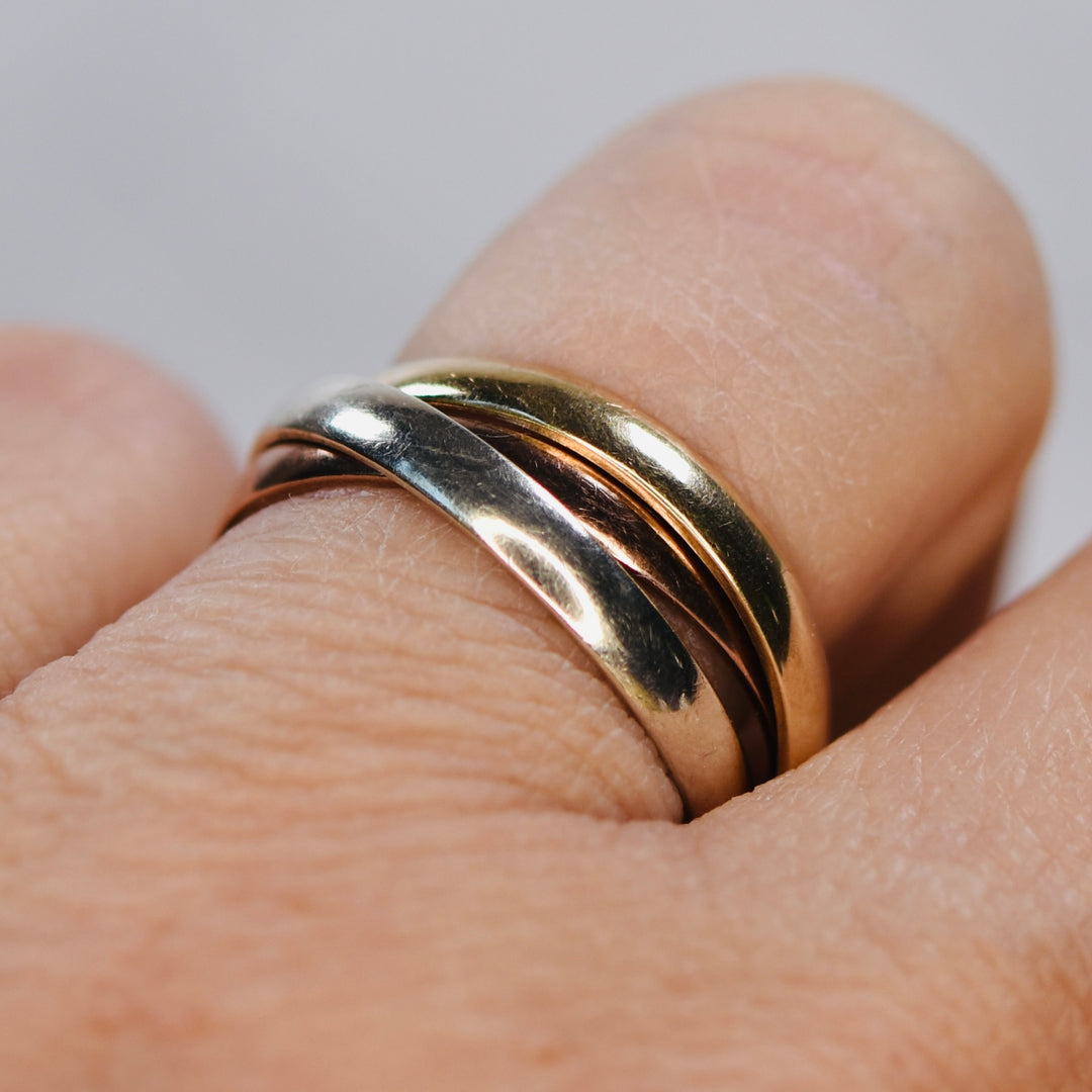 Vintage rolling ring in tri color gold from Manor Jewels