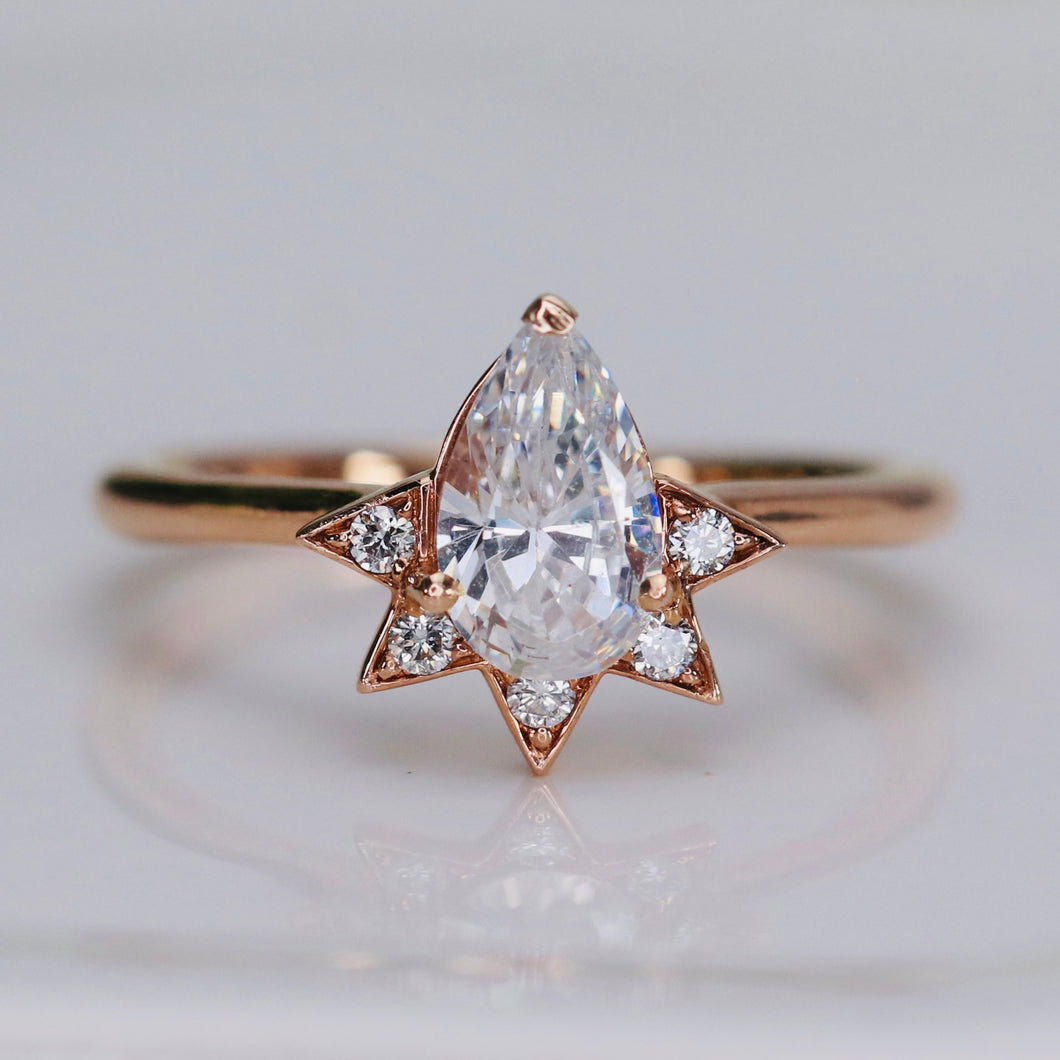 Pear shaped CZ and diamond ring in 14k rose gold