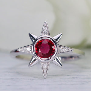 Ruby and diamond compass ring in 14k white gold from Manor Jewels